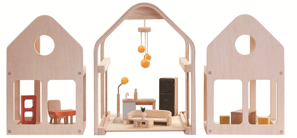 The PlanToys Slide N Go Dolls' House shown with the pieces separated on a plain background. 