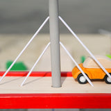 Close up of Plan Toys car on top of the Plan Toys Wooden Bridge