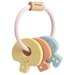 Plan Toys Hochet clé bébé pastel