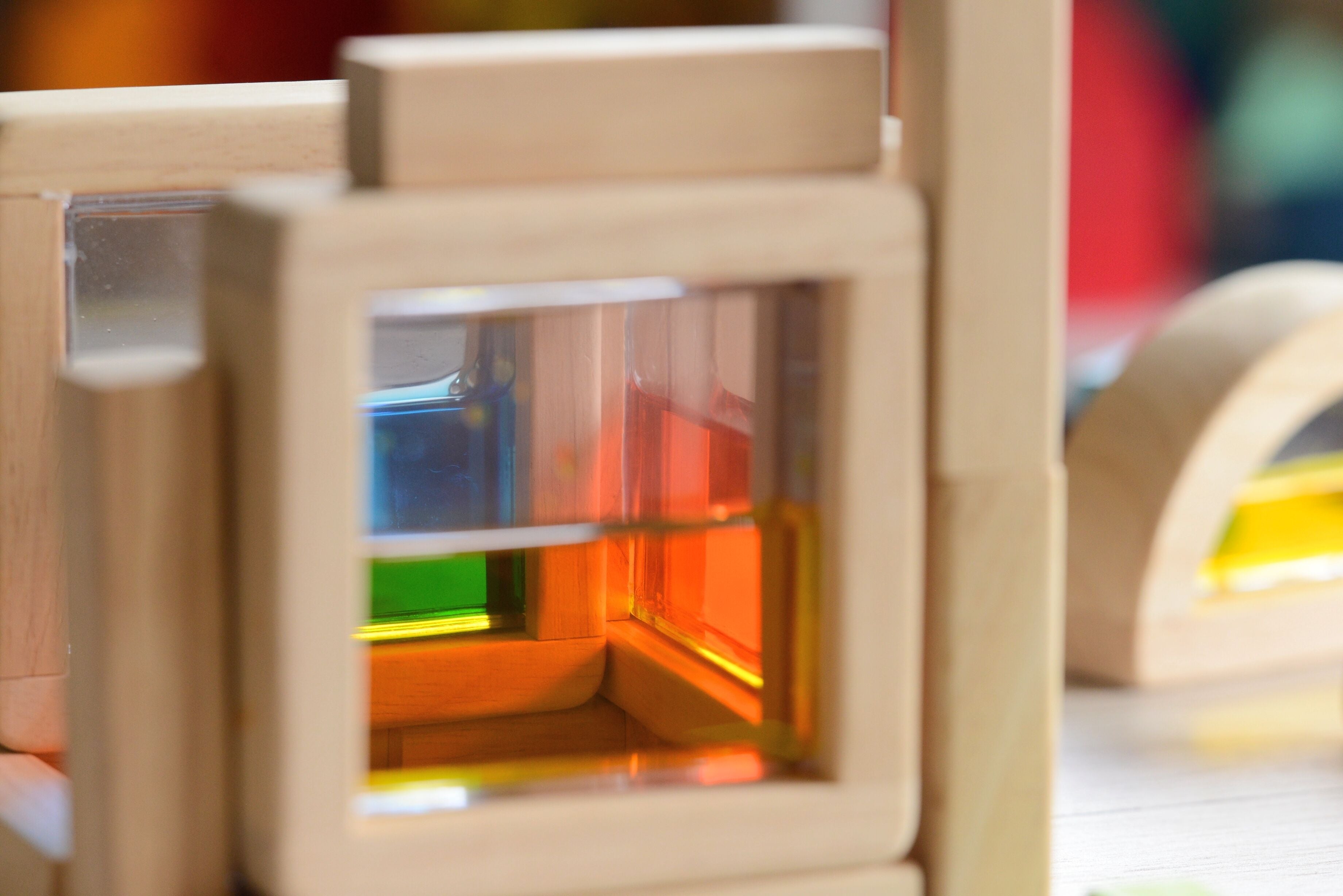 A close up of the yellow square block from the Plan Toys Water Blocks. 