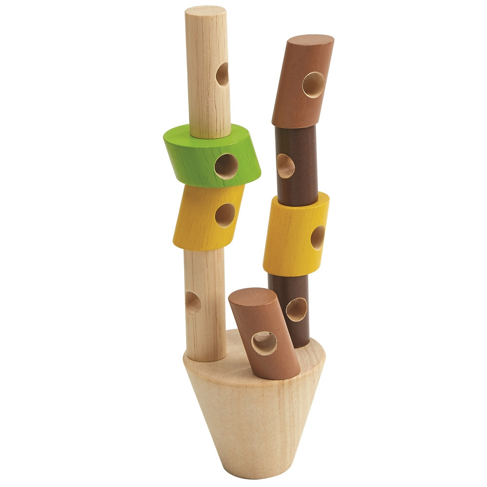 The PlanToys Stacking Logs Game on a plain background with three individual stacks shown on the base piece. 