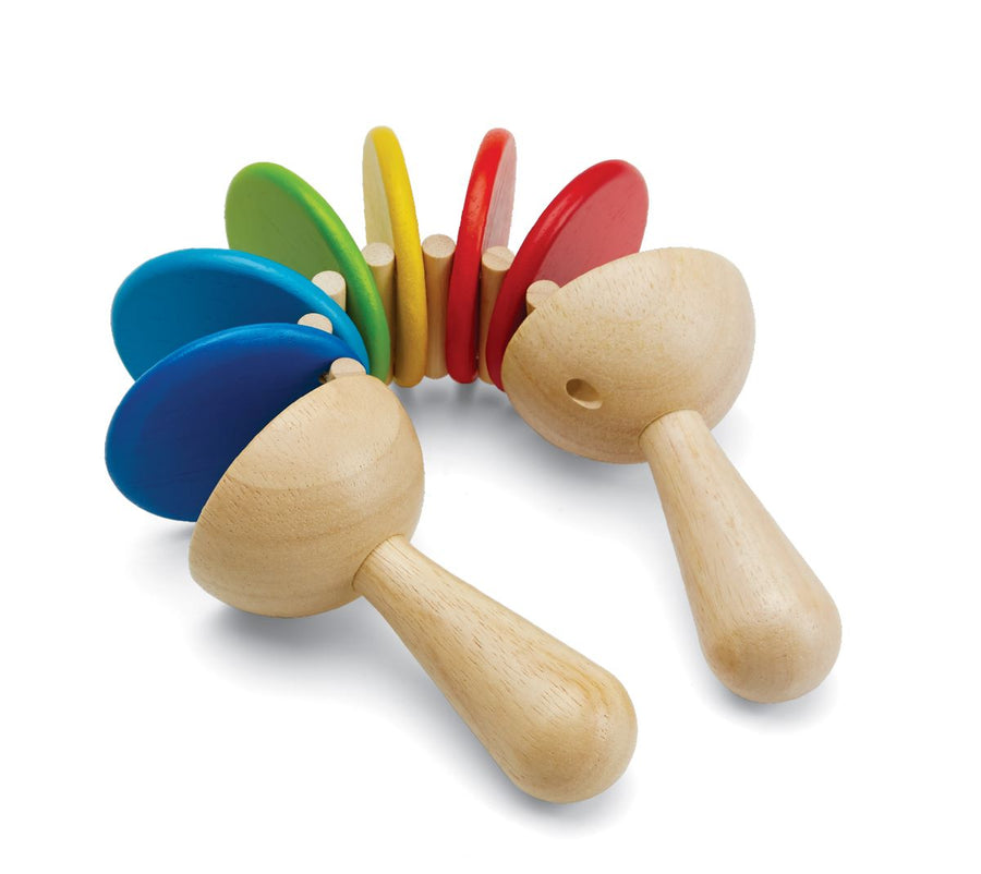 This classic Plan Toys Clatter toy is a musical toddler toy with natural rubberwood handles and brightly painted discs that rattle and clatter together. White background.