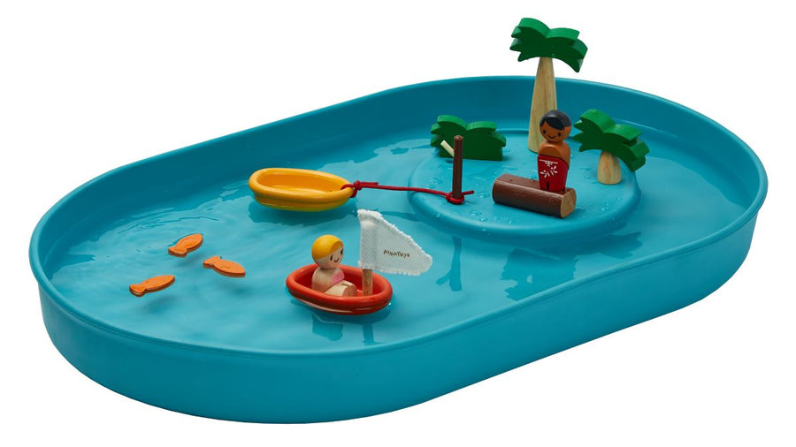 The Plan Toys Water Play Set is an exciting play tray inspiring creative water play and is a fabulous sensory toy for toddlers. A large blue tray holding water with an island for trees