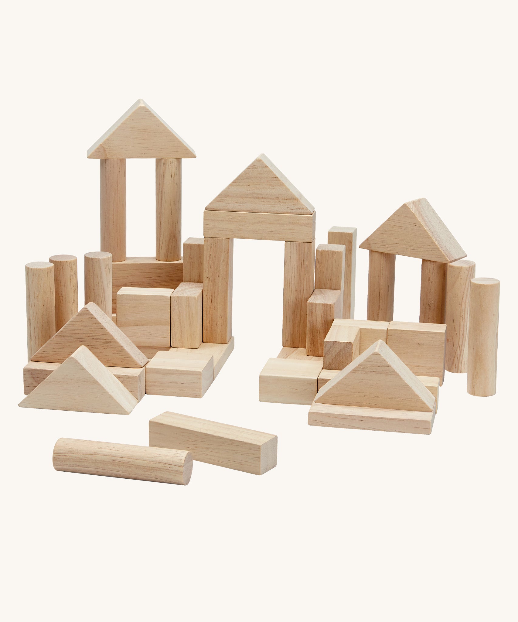 The PlanToys natural block set on a plain background. The blocks are shown without the packaging. 