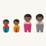 The PlanToys PlanWorld Black Skin, Black Hair Family on a plain background. 
