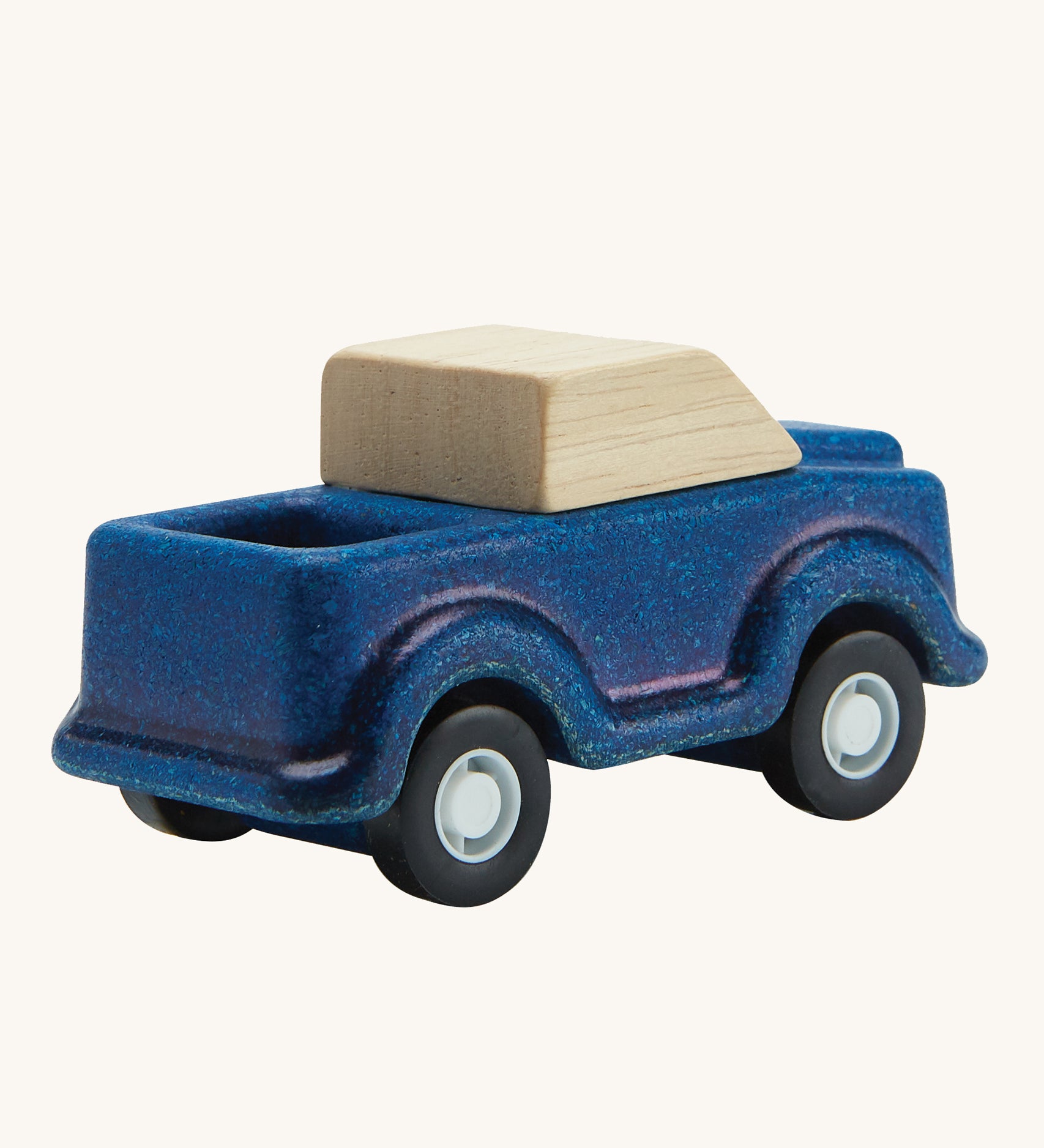 A view of the back of a PlanToys Blue Truck on a plain background. 
