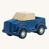 A PlanToys Blue Truck on a plain background. 
