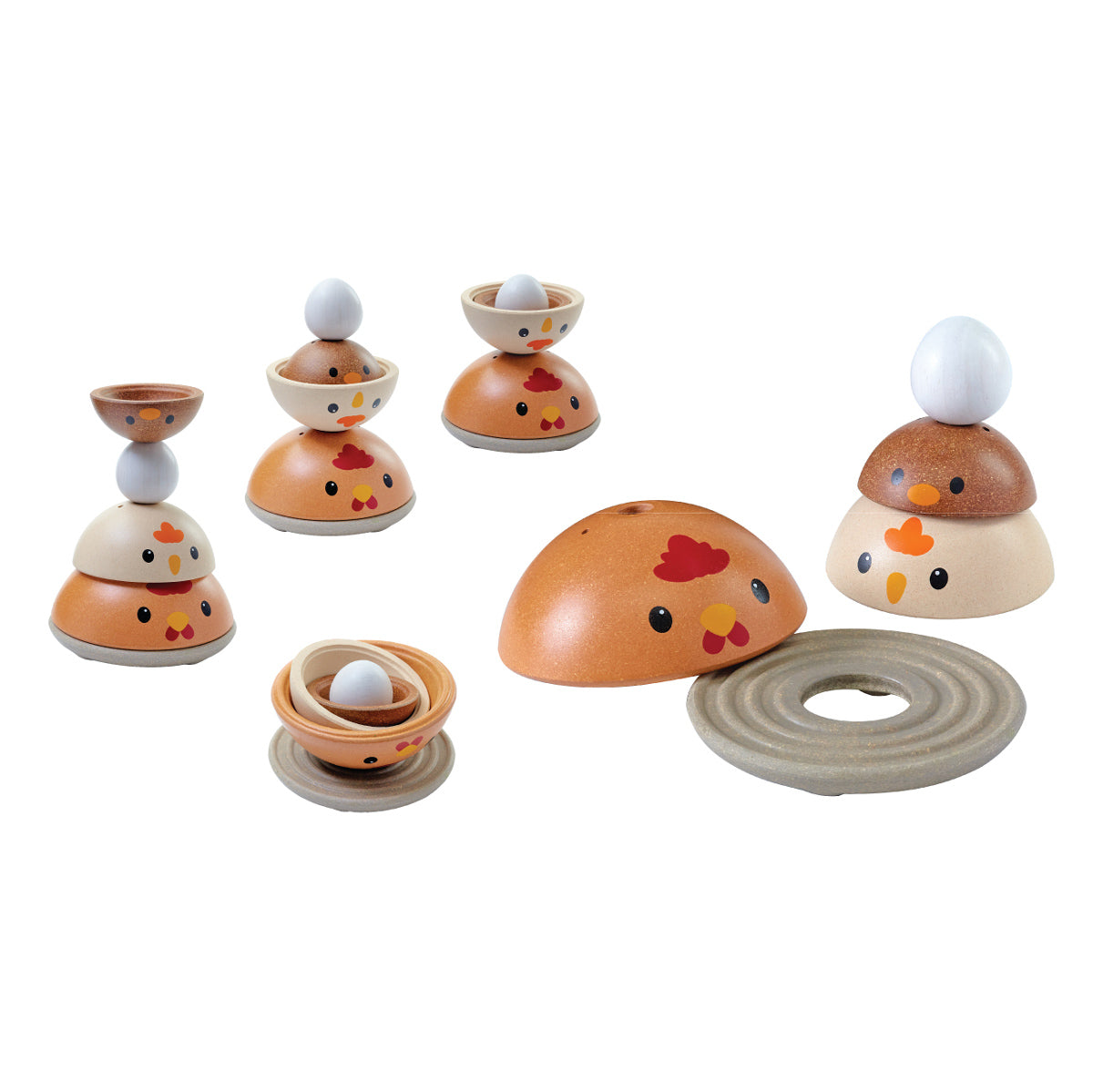 PlanToys plastic-free nesting chicken stacking bowls laid out on a white background