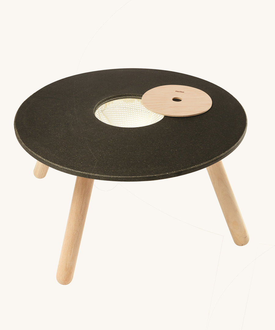 The PlanToys Round children's Table on a plain background. 