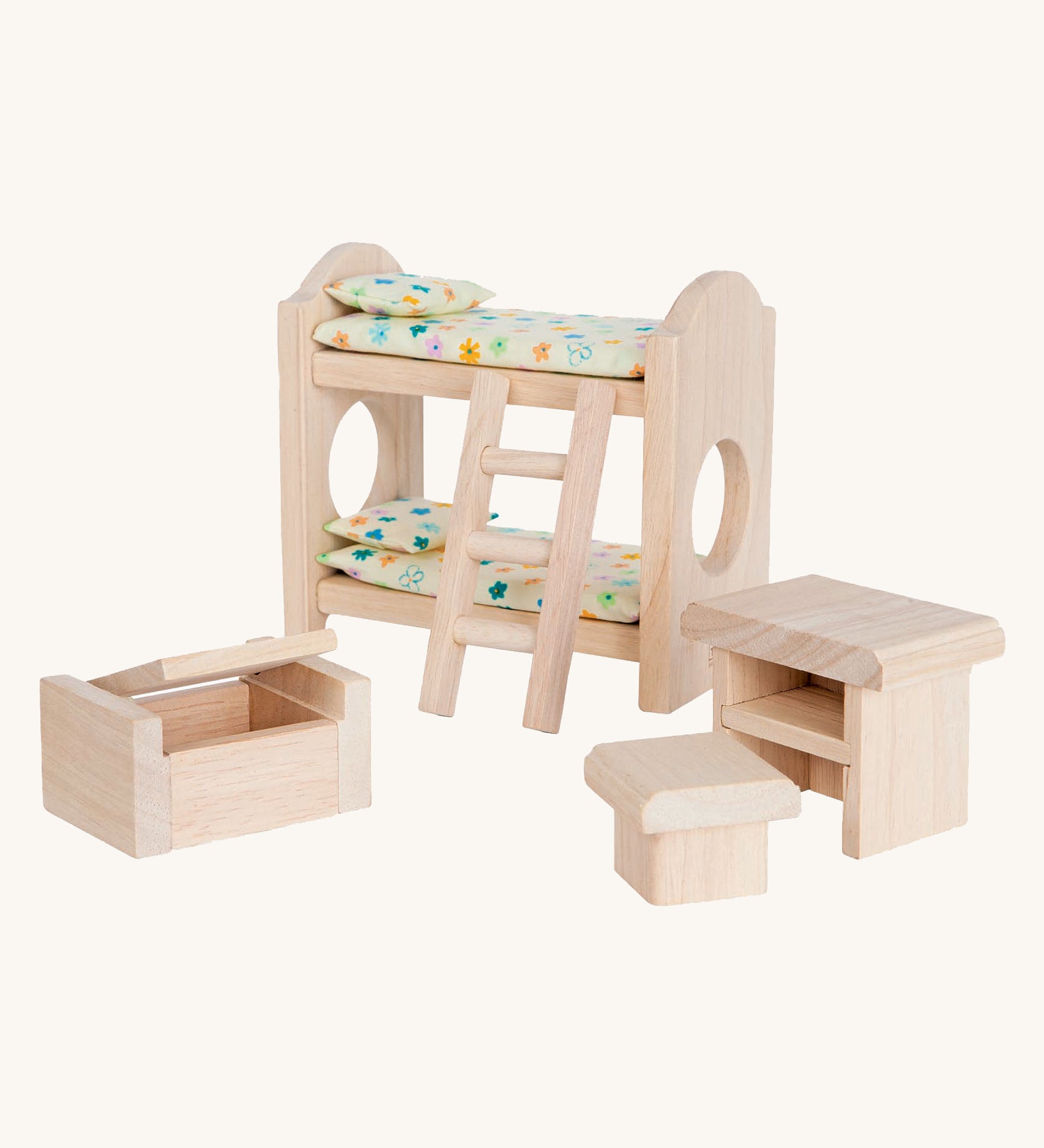 PlanToys Classic Children's Bedroom dolls house furniture set on a plain background. 