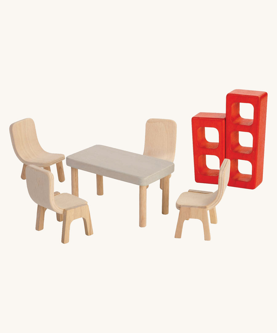 PlanToys Dining Room set for dolls house on a plain background. 