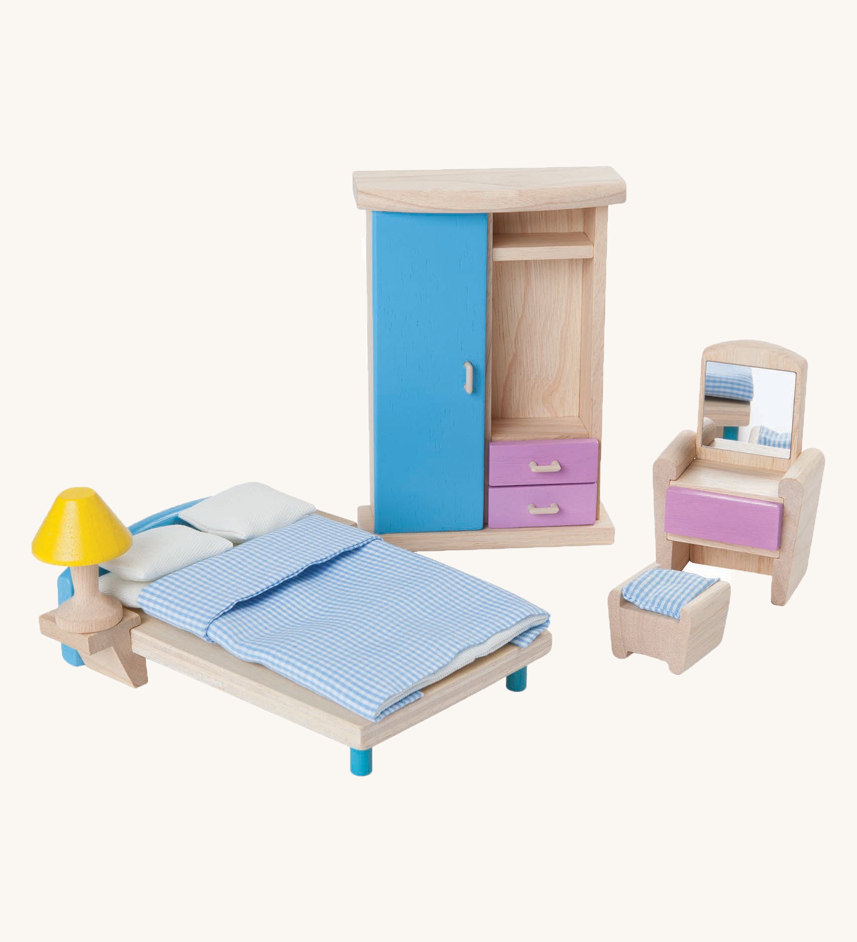 The Plan Toys Dolls House Bedroom neo set on a plain background. 
