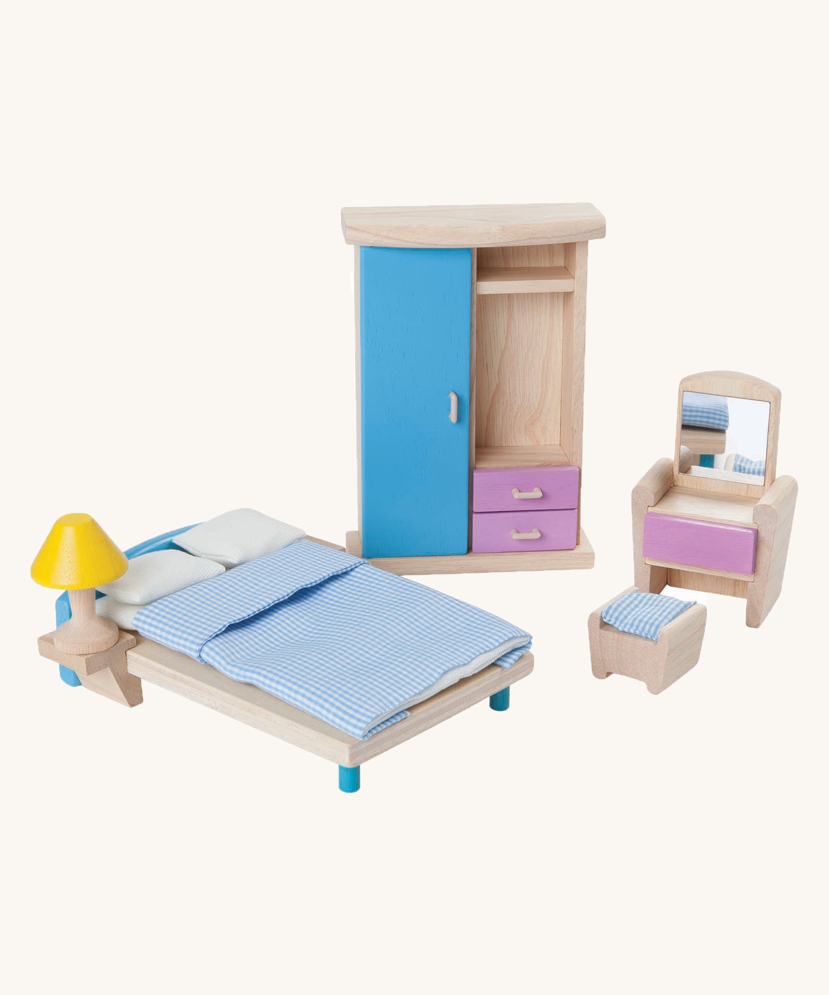 The Plan Toys Dolls House Bedroom neo set on a plain background. 
