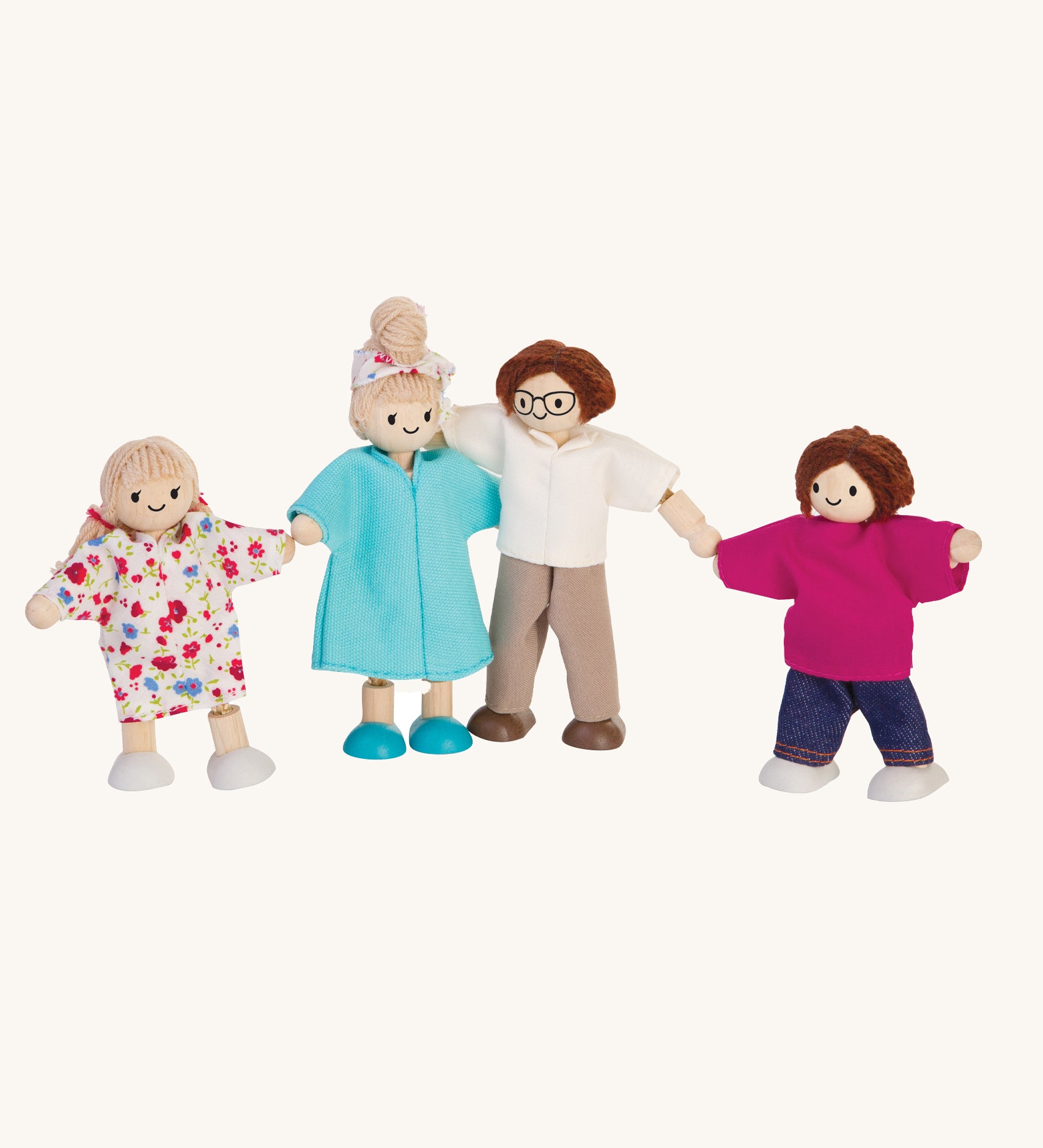 The PlanToys Dolls House Family with- White Skin, Brown and Blonde Hair on a plain background. 