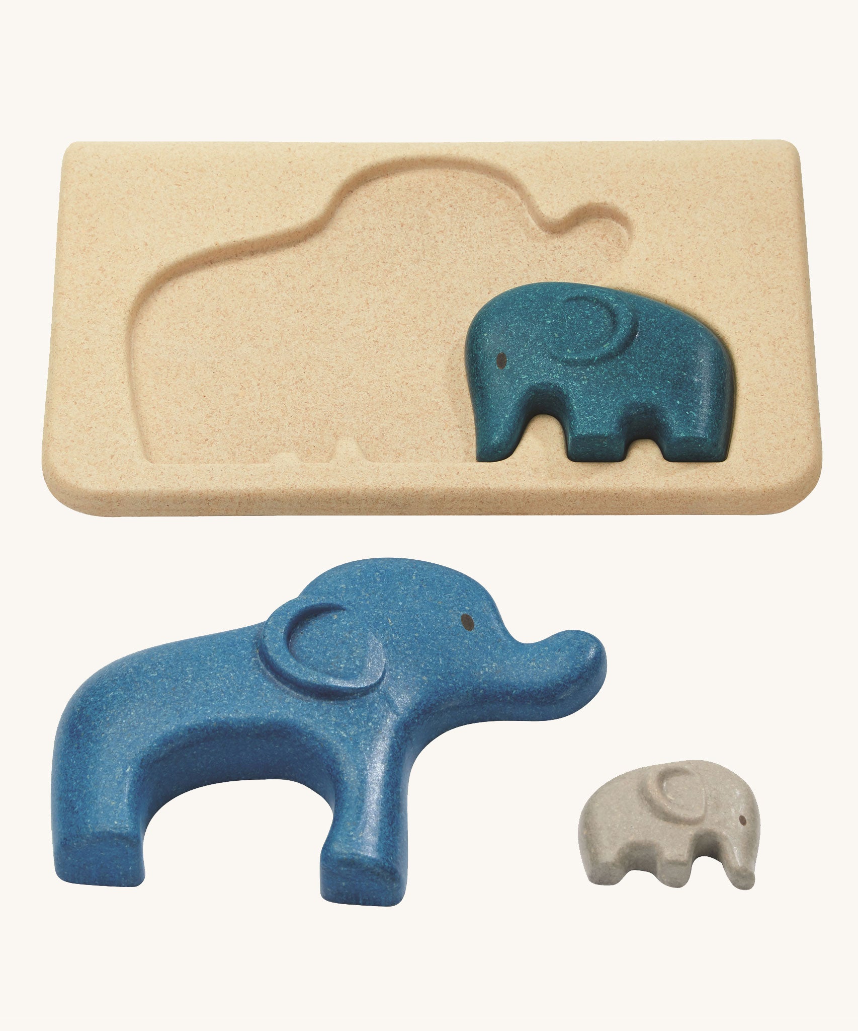 The PlanToys Elephant Puzzle on a plain background. The largest and smallest elephants have been taken out of the puzzle base. 