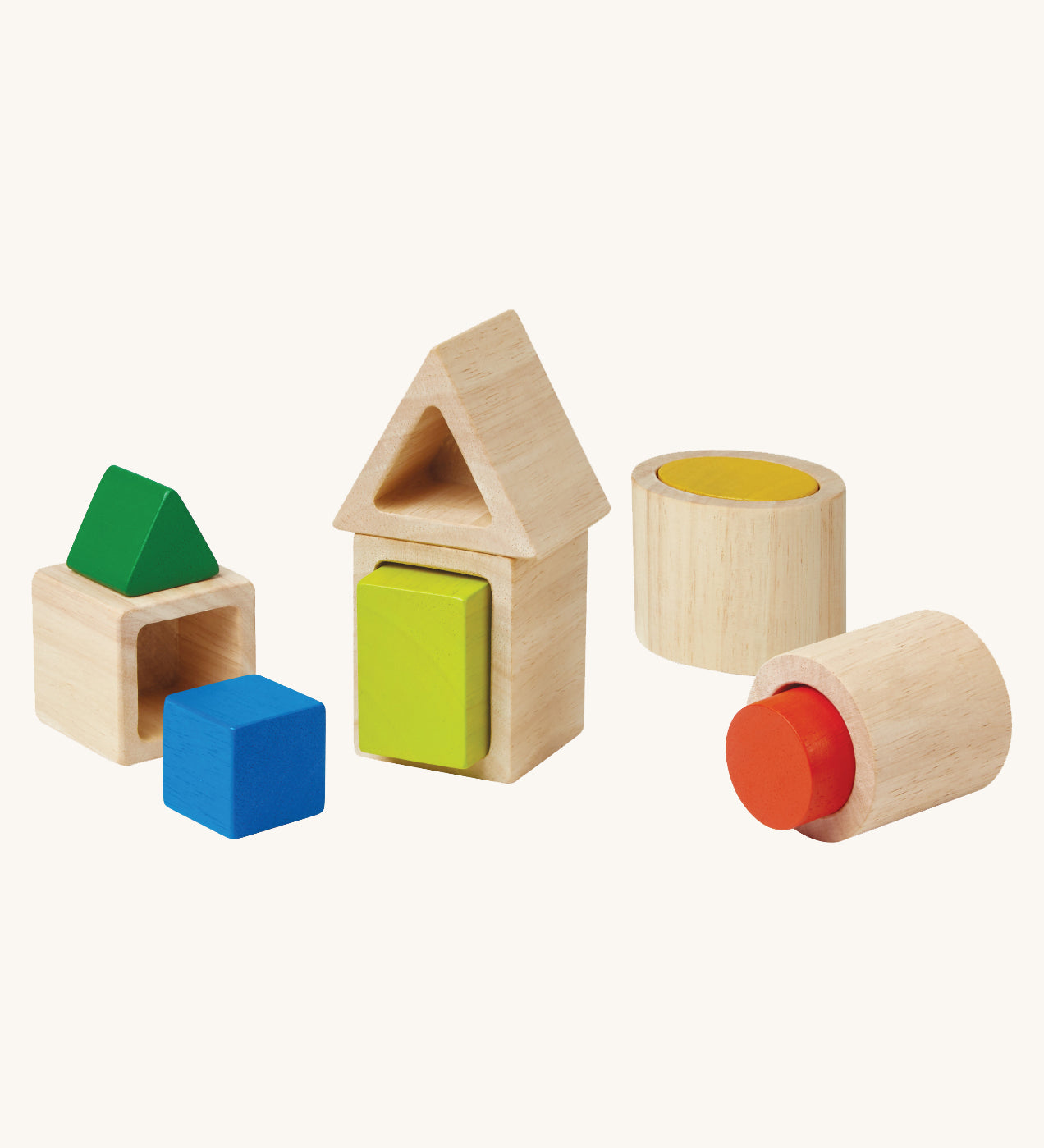 The PlanToys wooden Geo shapes Matching Blocks on a plain background. The blocks are shown out of their packaging. 
