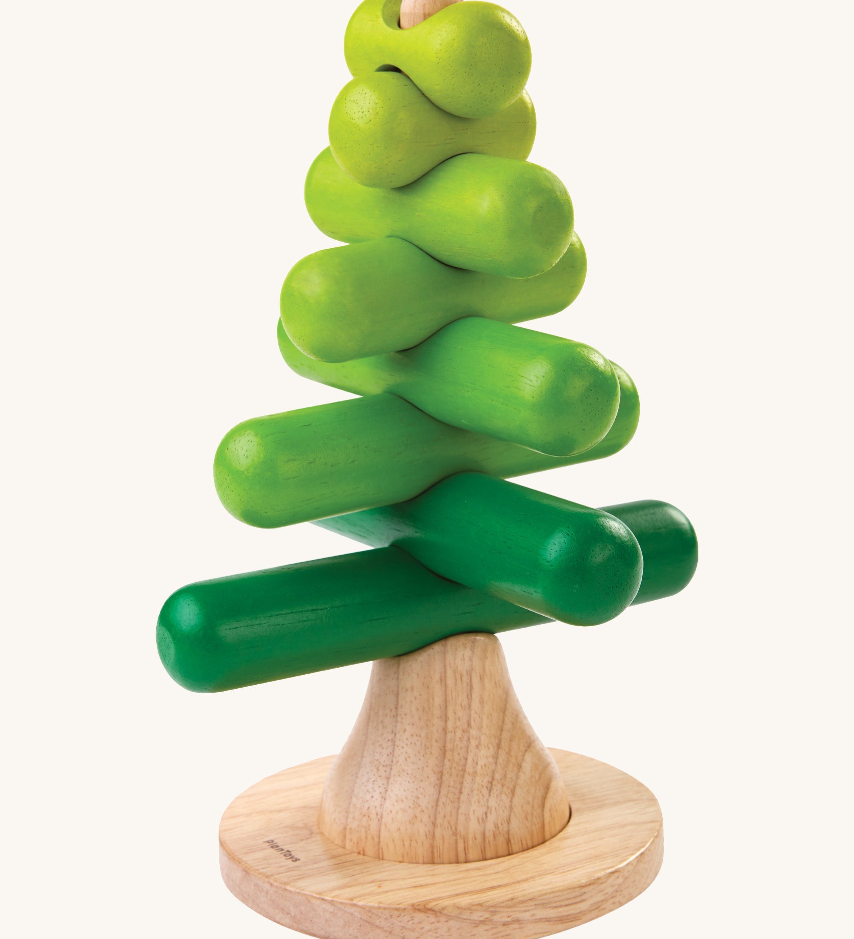 The PlanToys Stacking Tree Wooden Toy on a plain background. 