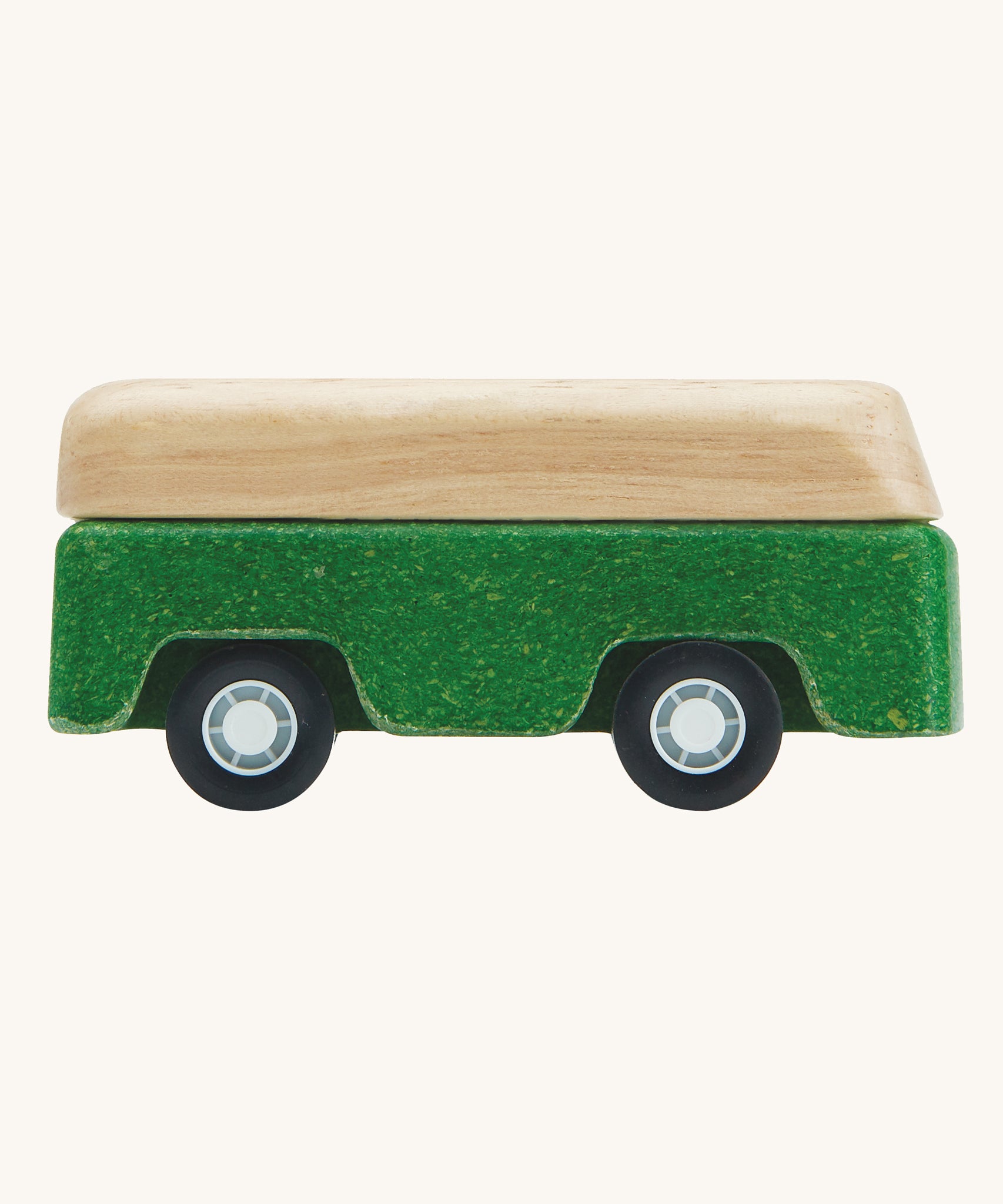 A side view of the PlanToys Green Bus on a plain background. 