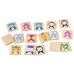 Pieces from the PlanToys kids plastic-free animal memory game laid out on a white background.