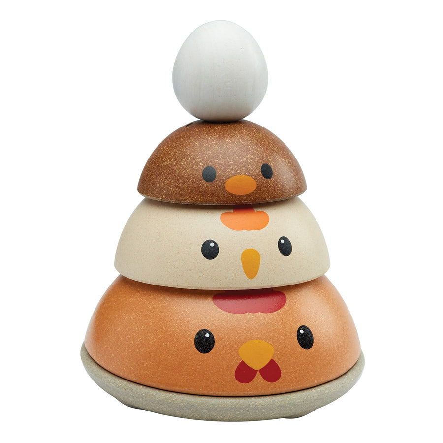 PlanToys kids wooden nesting chicken bowls stacked in a tower with a toy egg on top