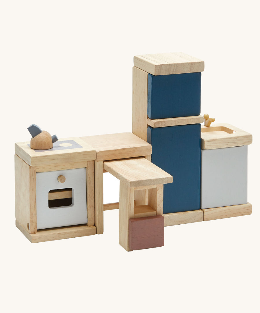 The PlanToys Kitchen Dolls House Furniture set on a plain background. 