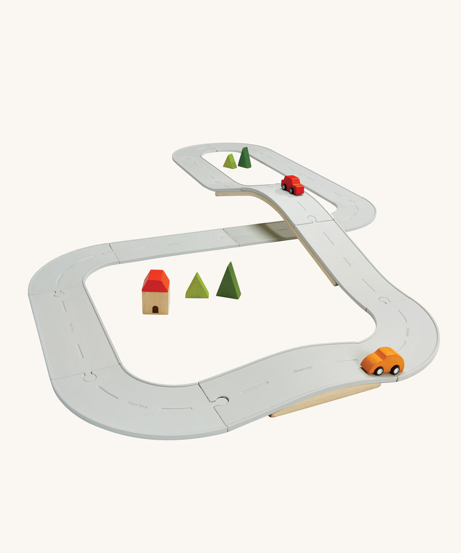 The Plan Toys large Rubber Road and Rail Set shown set up on a plain background.