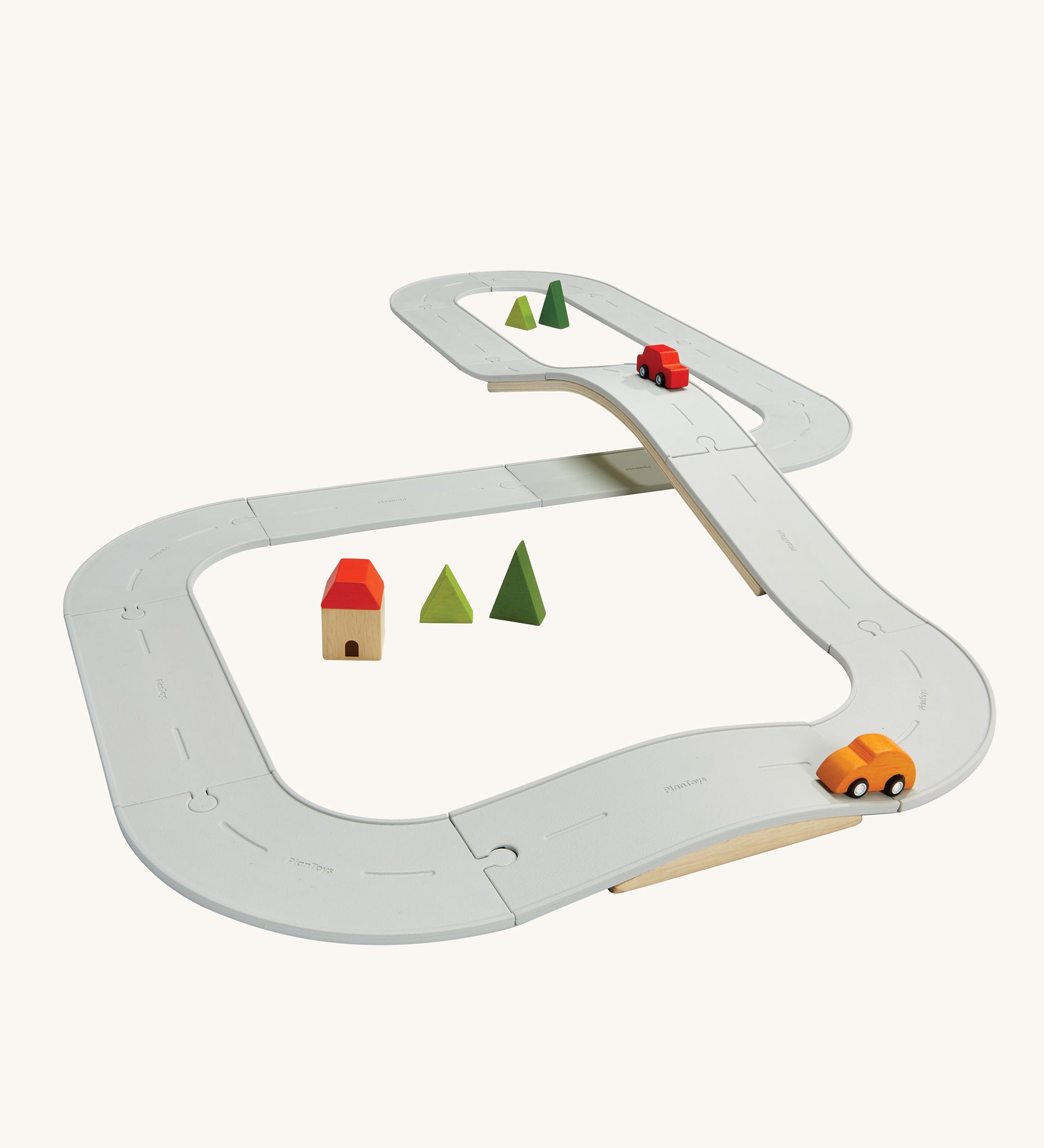 The Plan Toys large Rubber Road and Rail Set shown set up on a plain background.