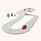 The Plan Toys large Rubber Road and Rail Set shown set up on a plain background.