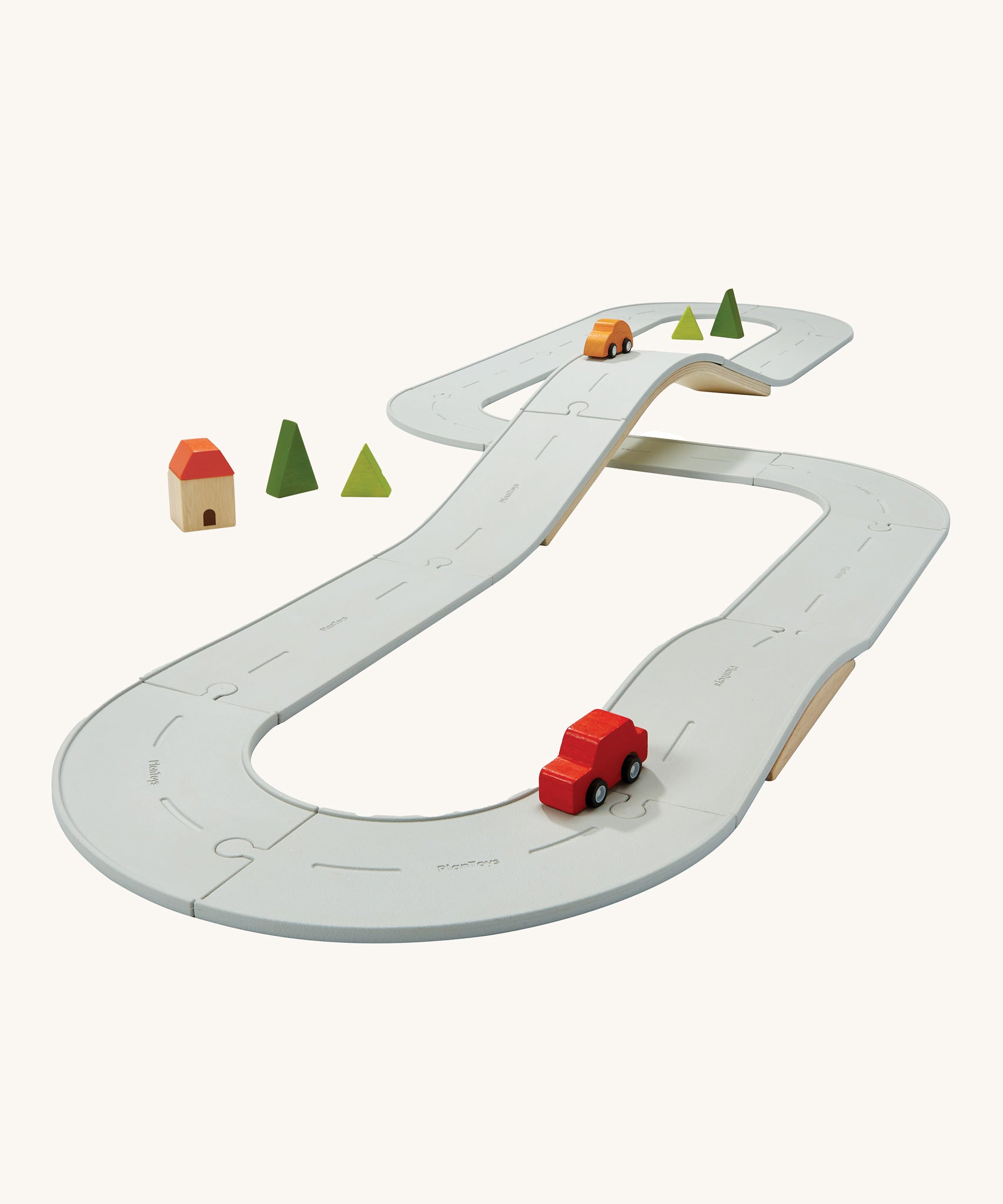 The Plan Toys large Rubber Road and Rail Set shown set up on a plain background.