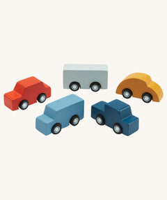 The PlanToys Mini Cars Set on a plain background. 
