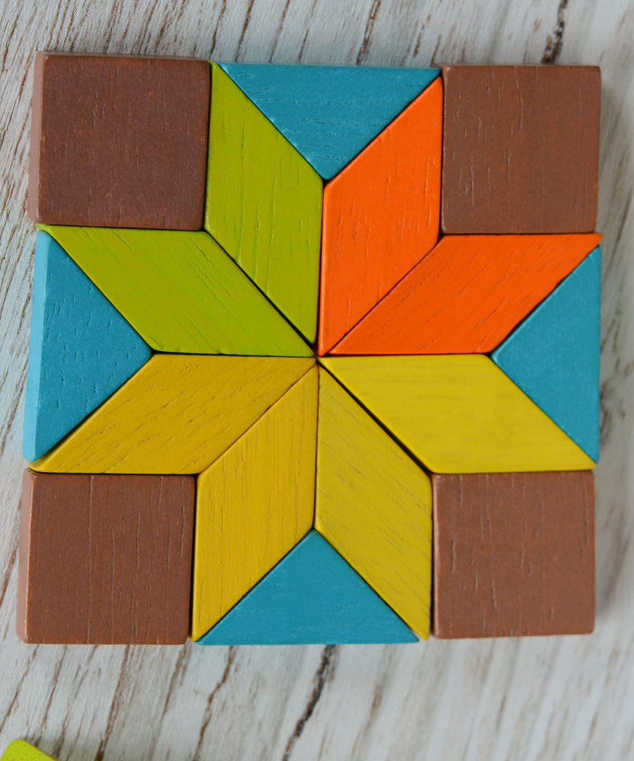 A star in a square shape created using pieces from the PlanToys Mini Mosaic Blocks