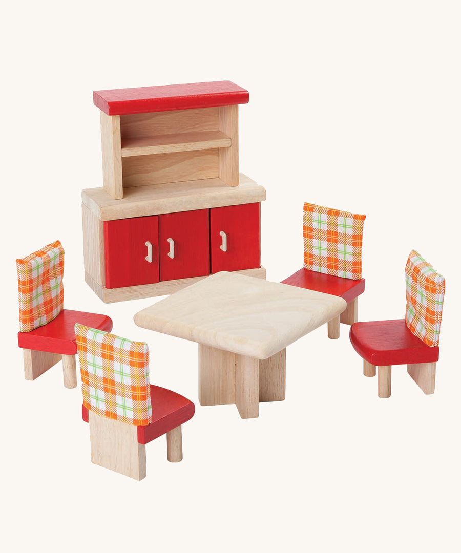 Plan Toys Dolls House Dining Room furniture set on a plain background. 