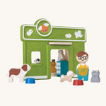 The PlanToys animal shelter pet shop, with a peg doll shopkeeper and little wooden cats and dogs.