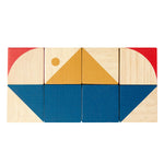 PlanToys childrens wooden geo pattern cubes laid out in a boat shape on a white background