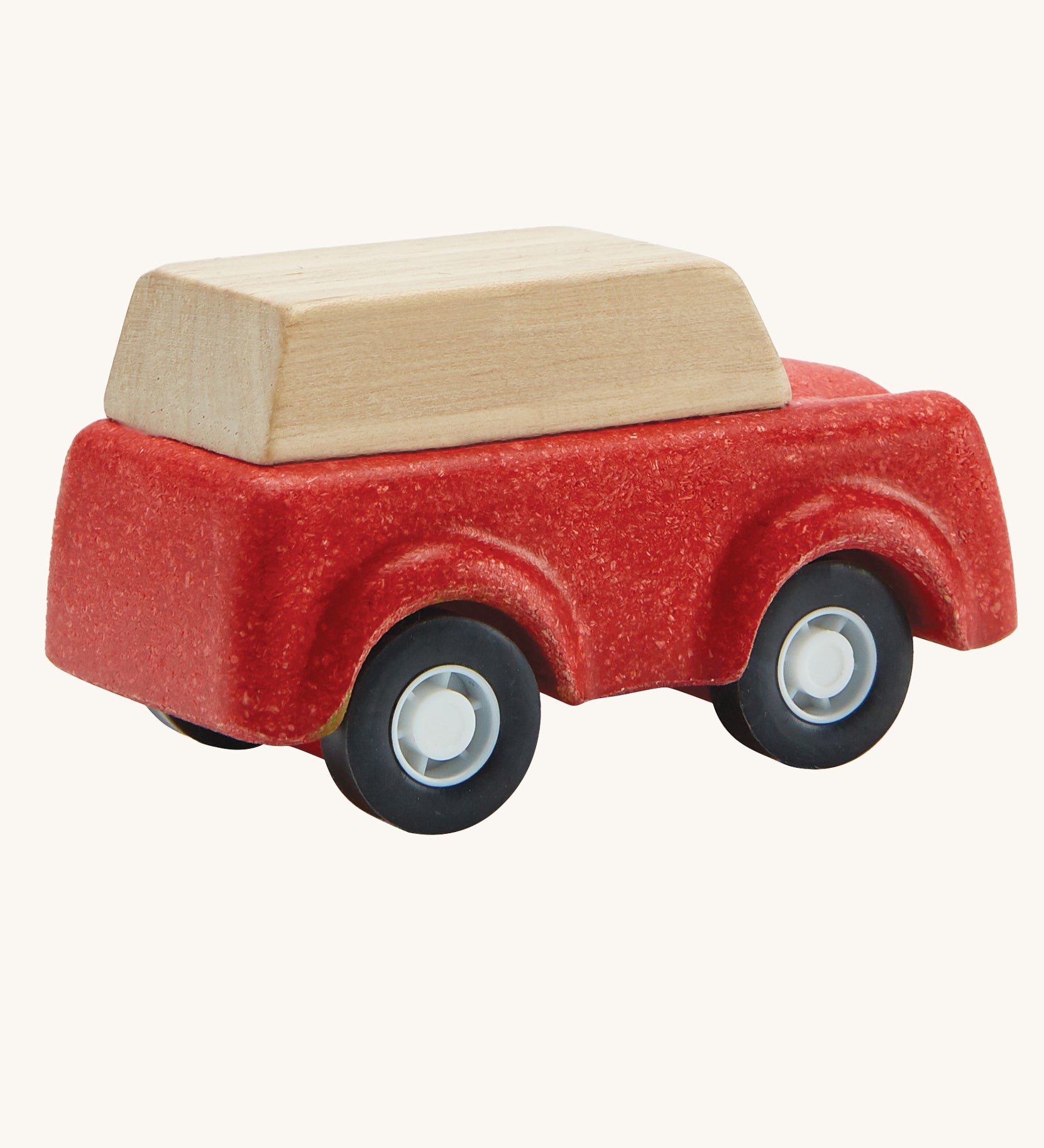 A view of teh back of a PlanToys Red SUV toy car on a plain background.