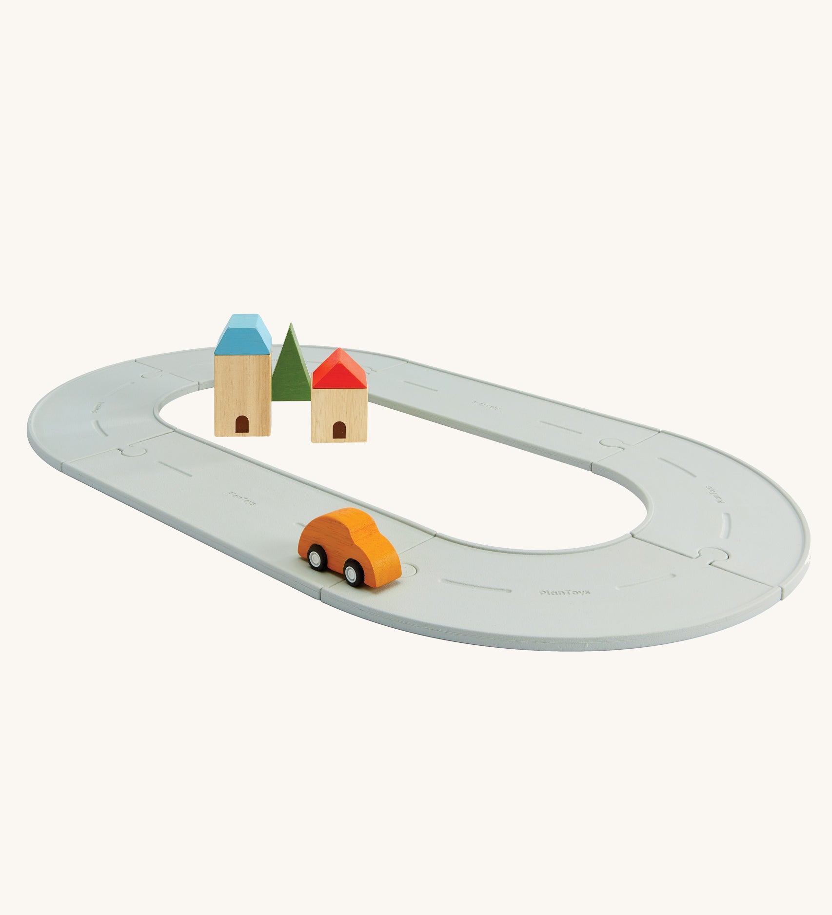 The PlanToys small Rubber Road and Rail Set on a plain background.