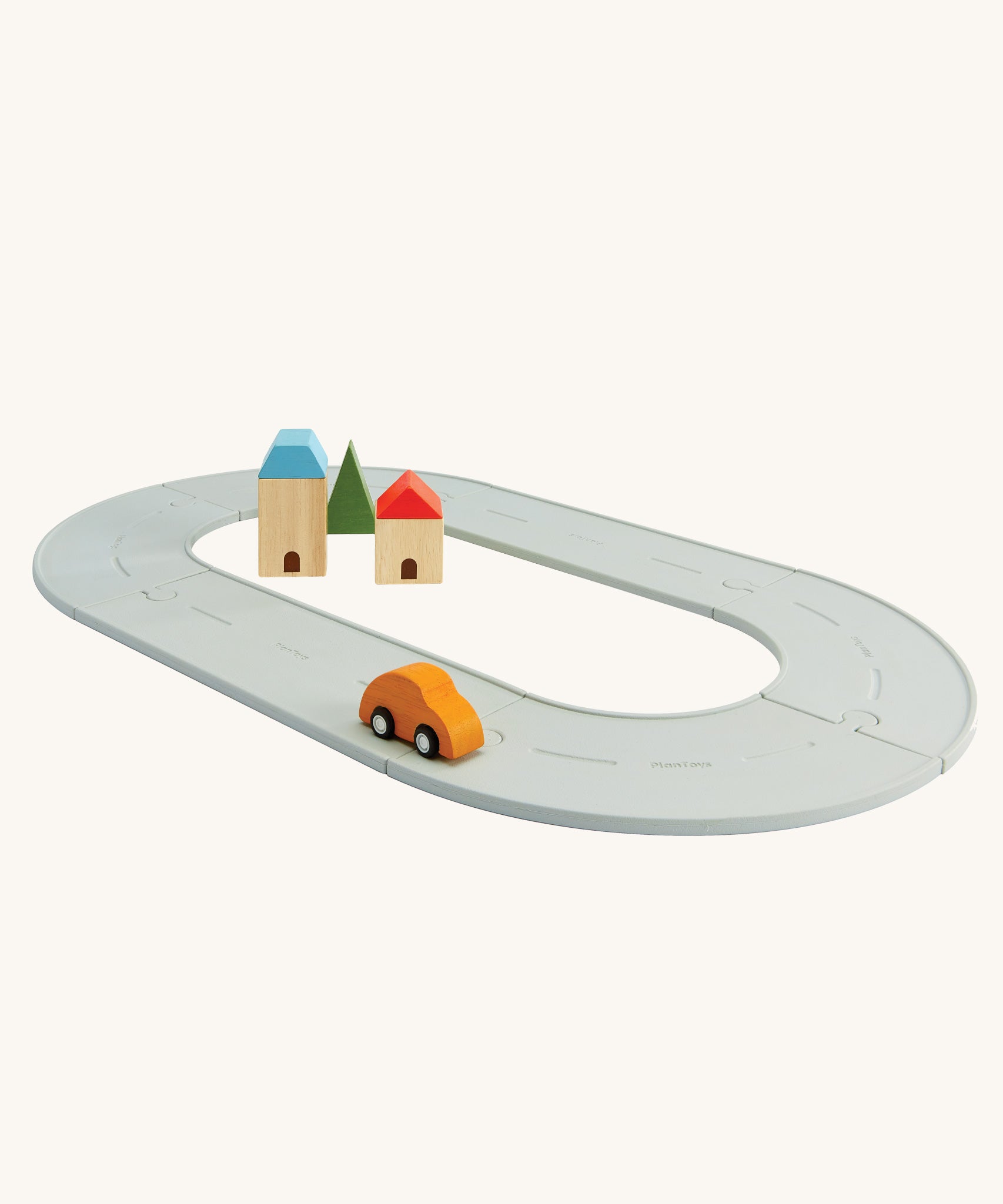 The PlanToys small Rubber Road and Rail Set on a plain background.