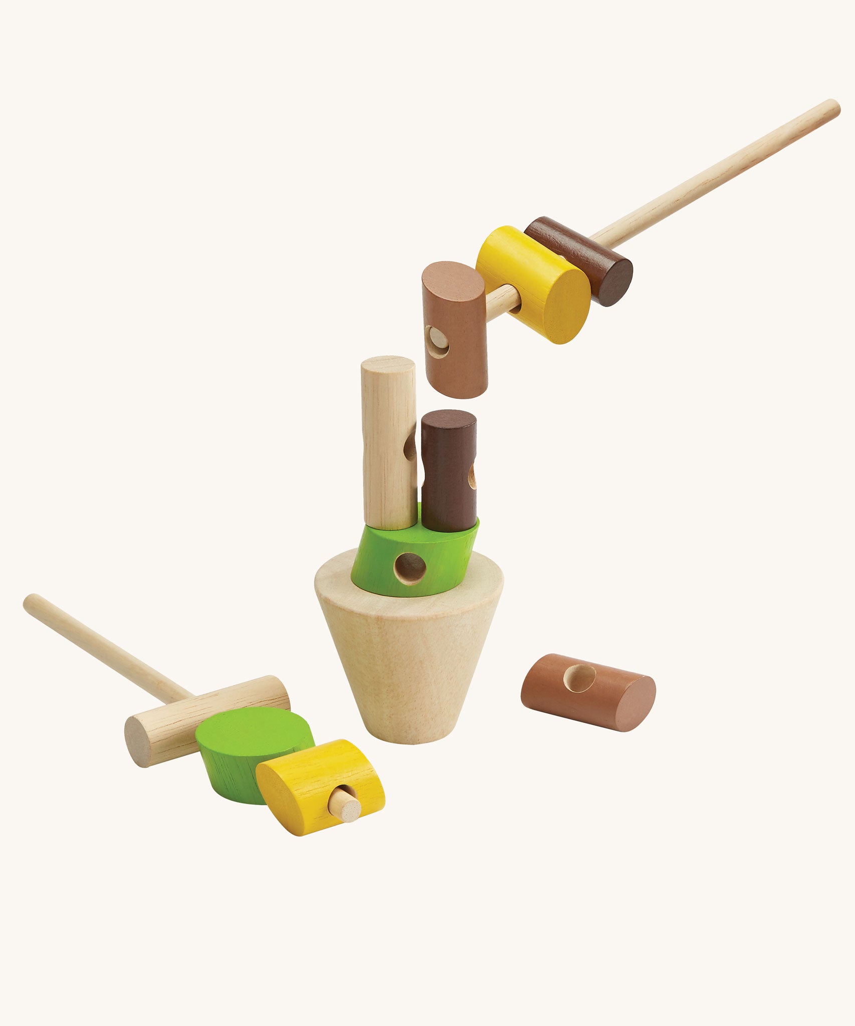 The PlanToys Stacking Logs Game on a plain background, some pieces are on the sticks and some are on the base. 