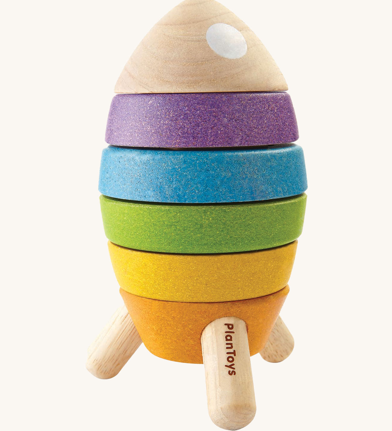 The PlanToys Stacking Rocket toy on a plain background. 
