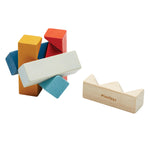 The PlanToys plastic-free slotting wooden block puzzle on a white background.