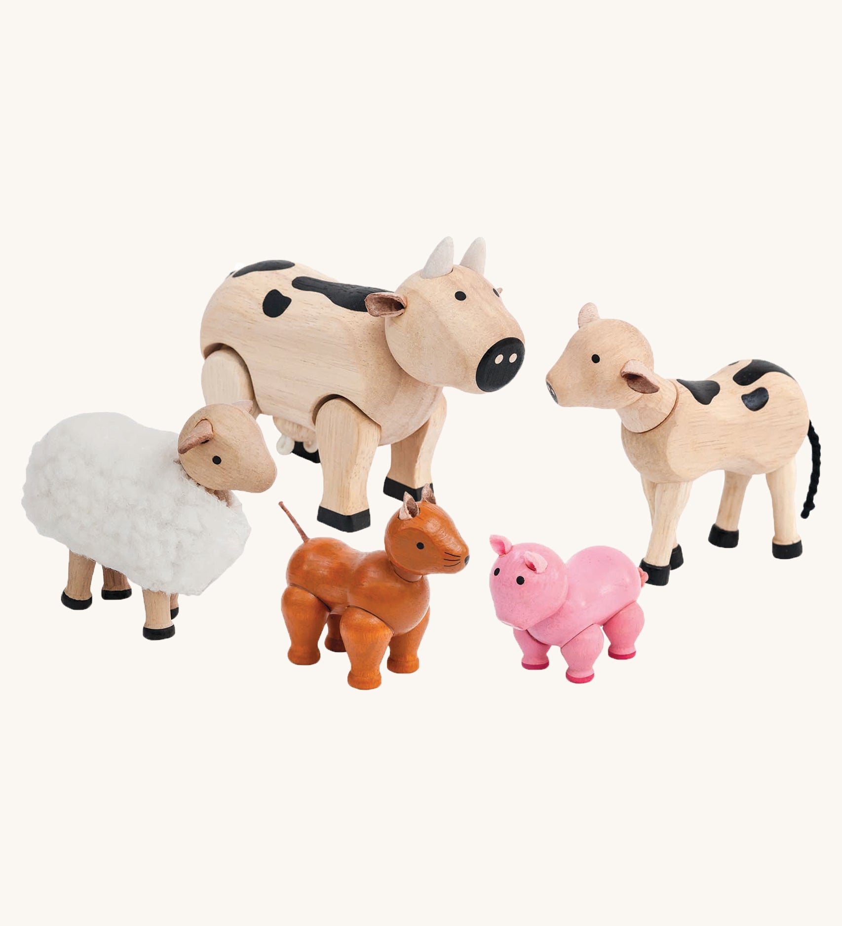 PlanToys Farm Animals Set on a plain background. 
