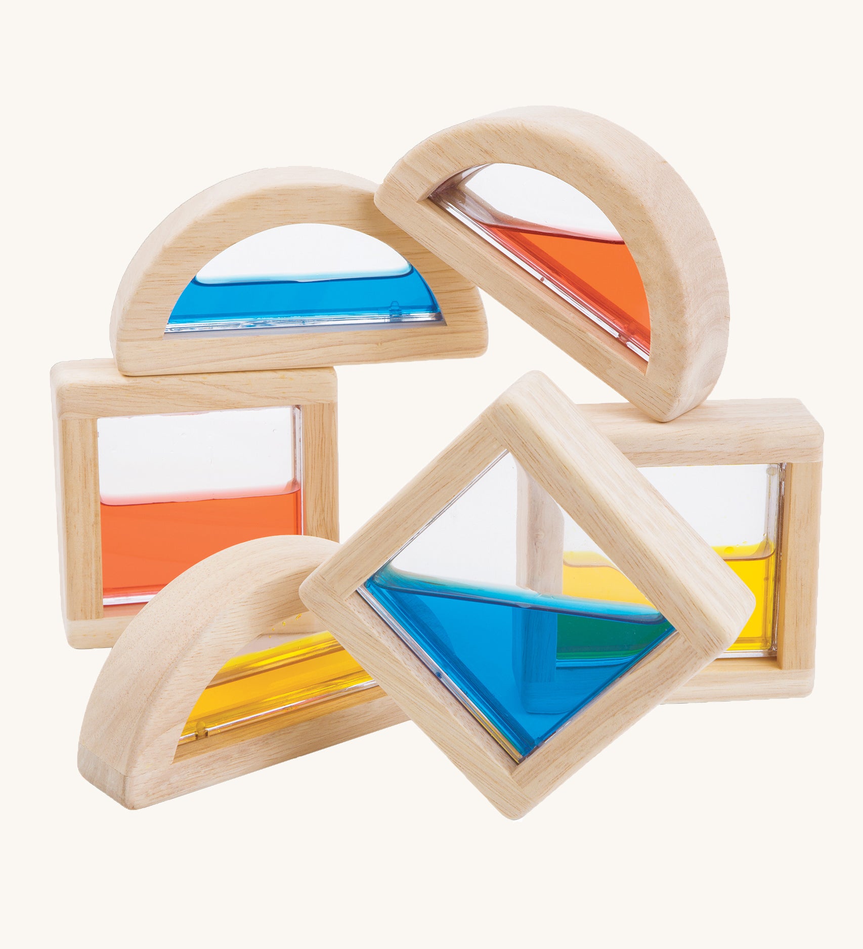 PlanToys wooden sensory Water Blocks on a plain background. The blocks are pictured out of their packaging. 
