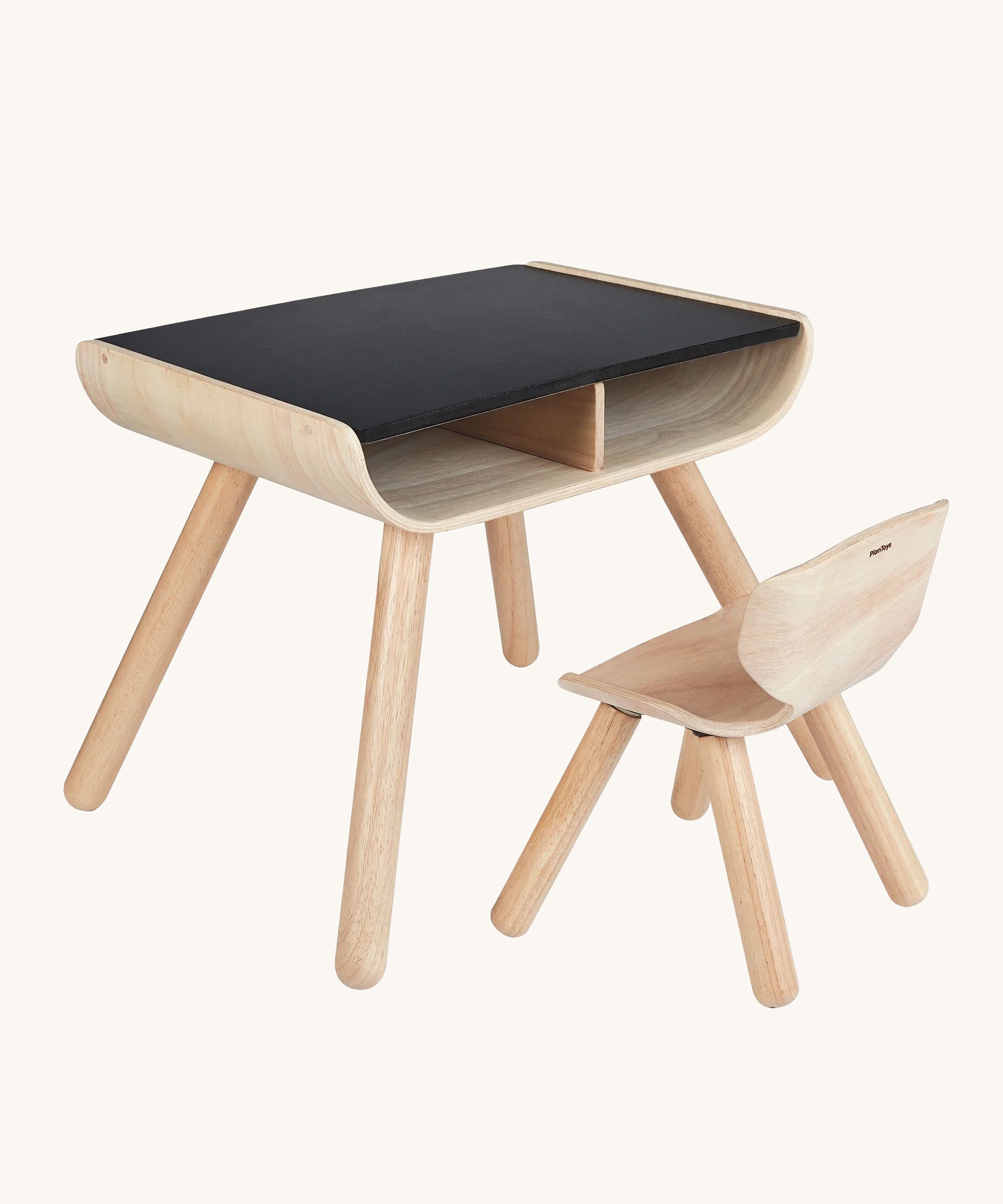 PlanToys wooden child's chair and desk on a plain background.