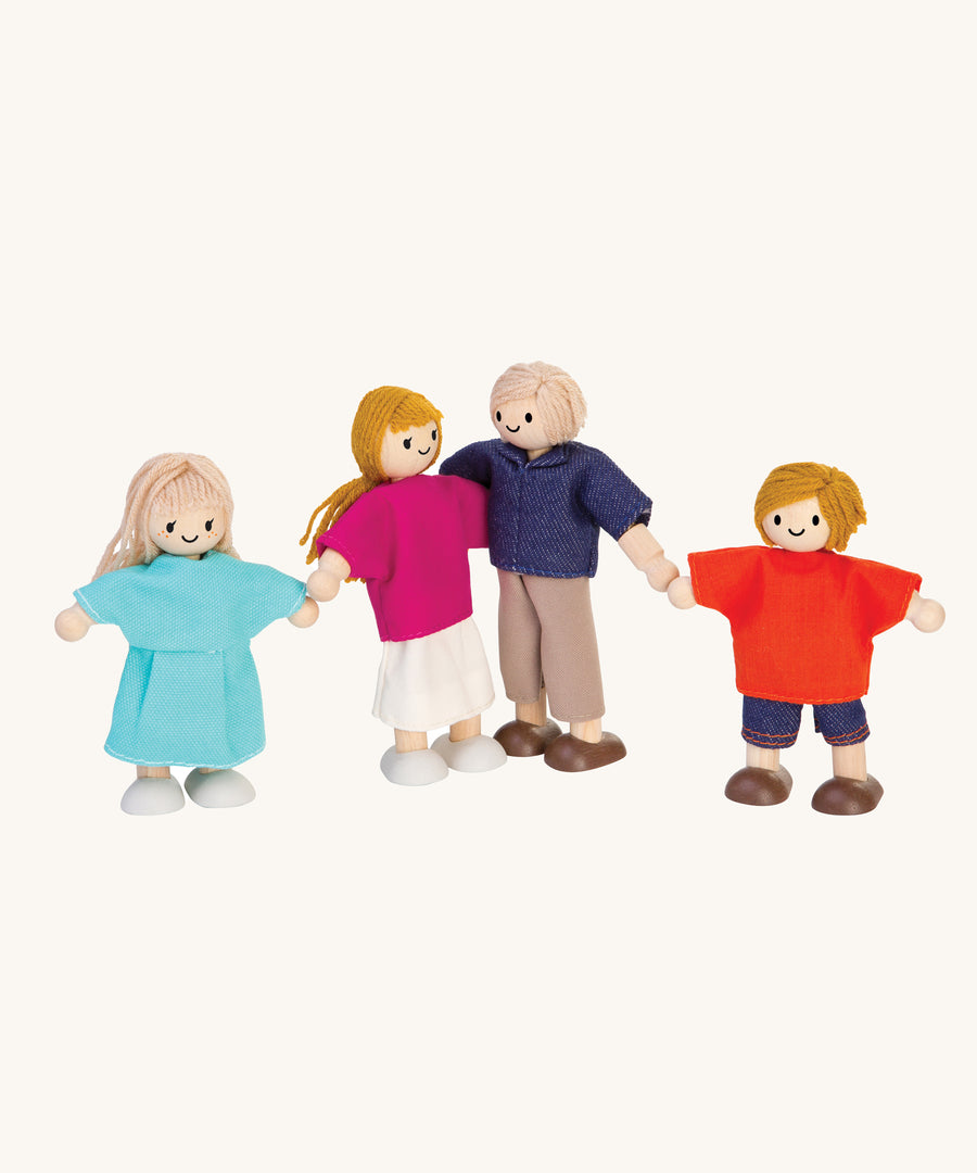 PlanToys Dolls House Family with White Skin and Blonde Hair on a plain background. 