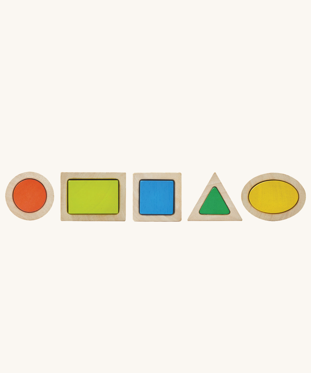 The PlanToys wooden Geo shapes Matching Blocks on a plain background. The blocks are shown out of their packaging all lined up next to each other. 
