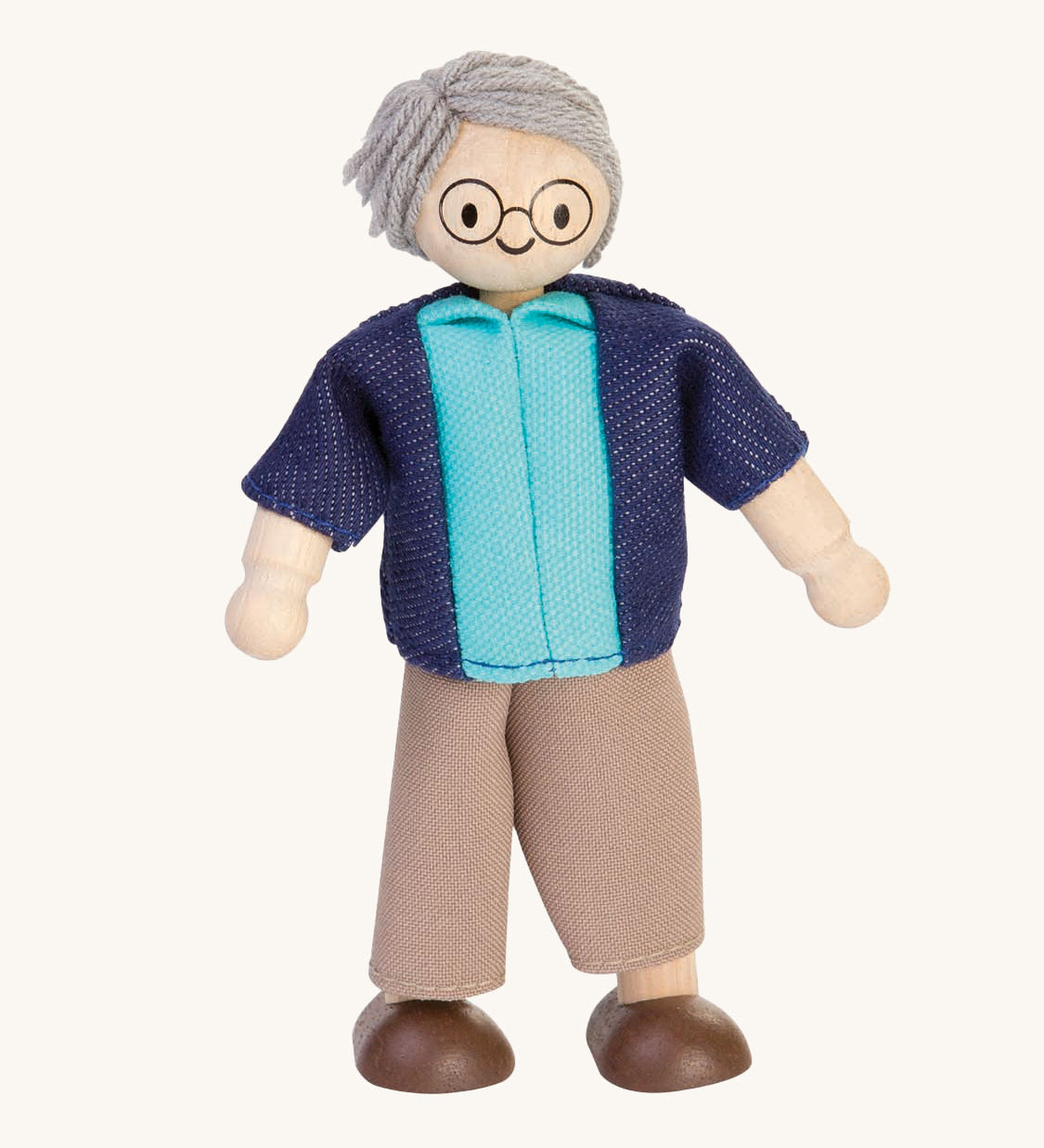 Plan Toys Grandfather Doll on a plain background. 
