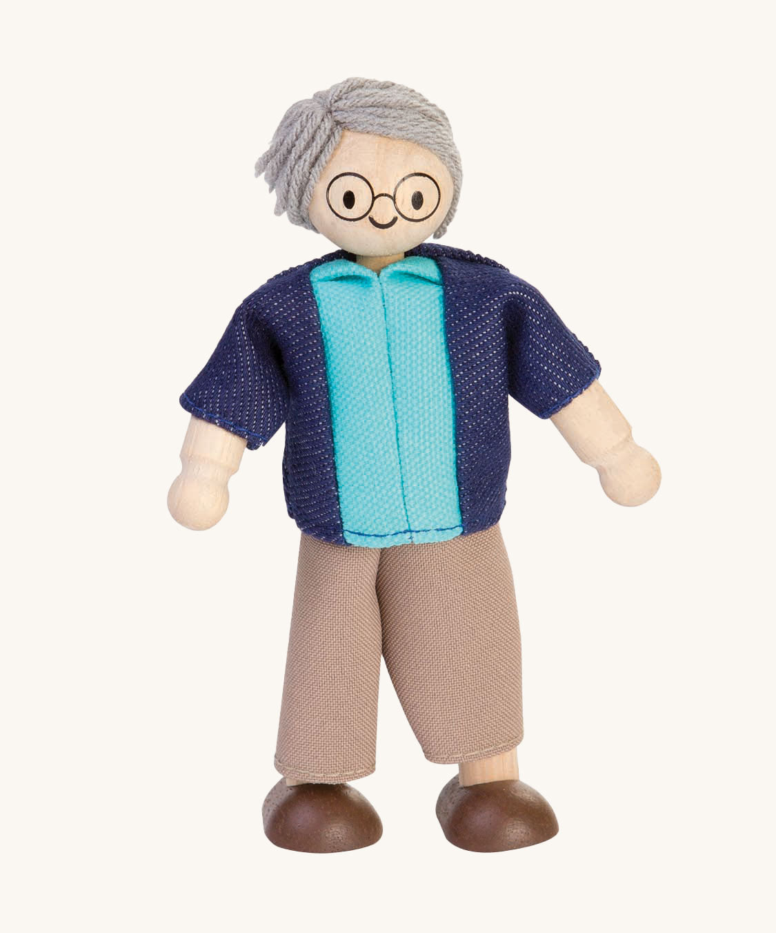 Plan Toys Grandfather Doll on a plain background. 
