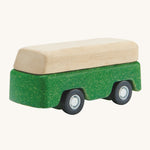 A PlanToys Green Bus on a plain background. 
