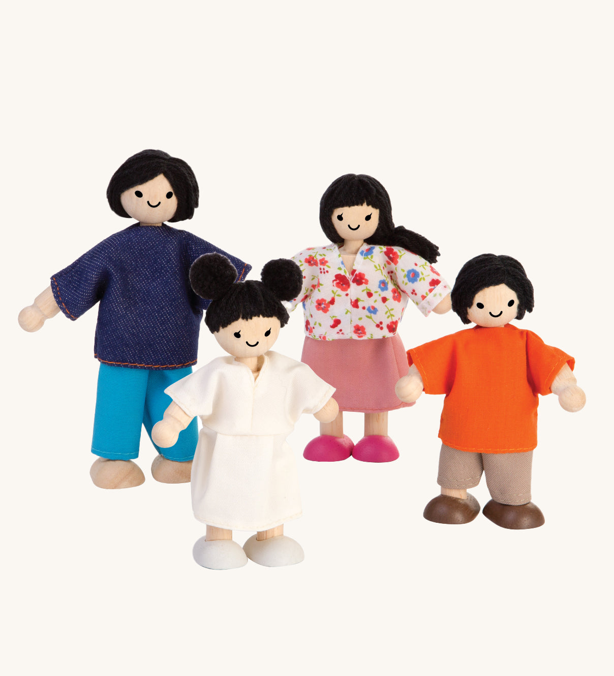 The PlanToys Dolls House Family with White Skin and Black Hair on a plain background. 