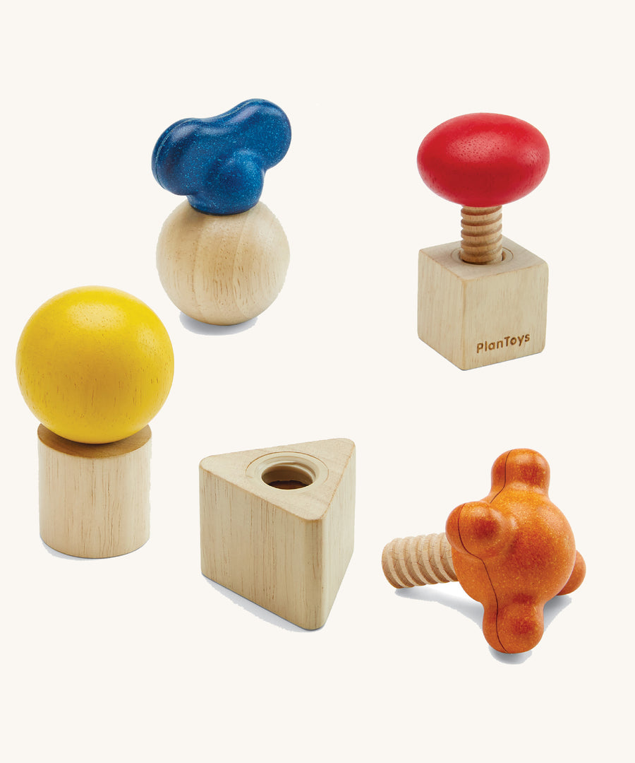 PlanToys Wooden Nuts & Bolts set on a plain background. 